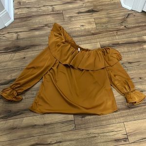 Glam gold one shoulder ruffle top